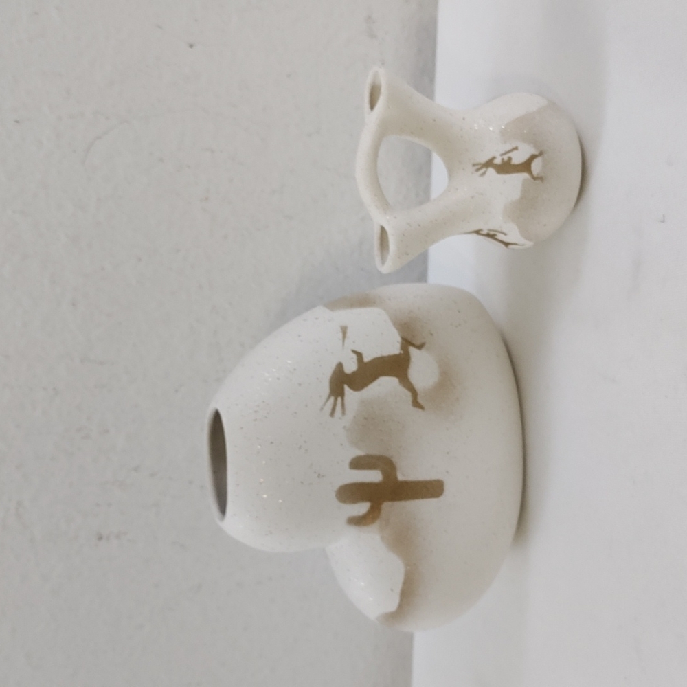 Source Unknown White and Brown Ceramic Vases